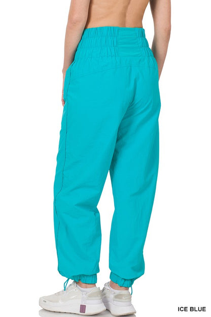 WINDBREAKER SMOCKED HIGH WAISTBAND JOGGER PANTS